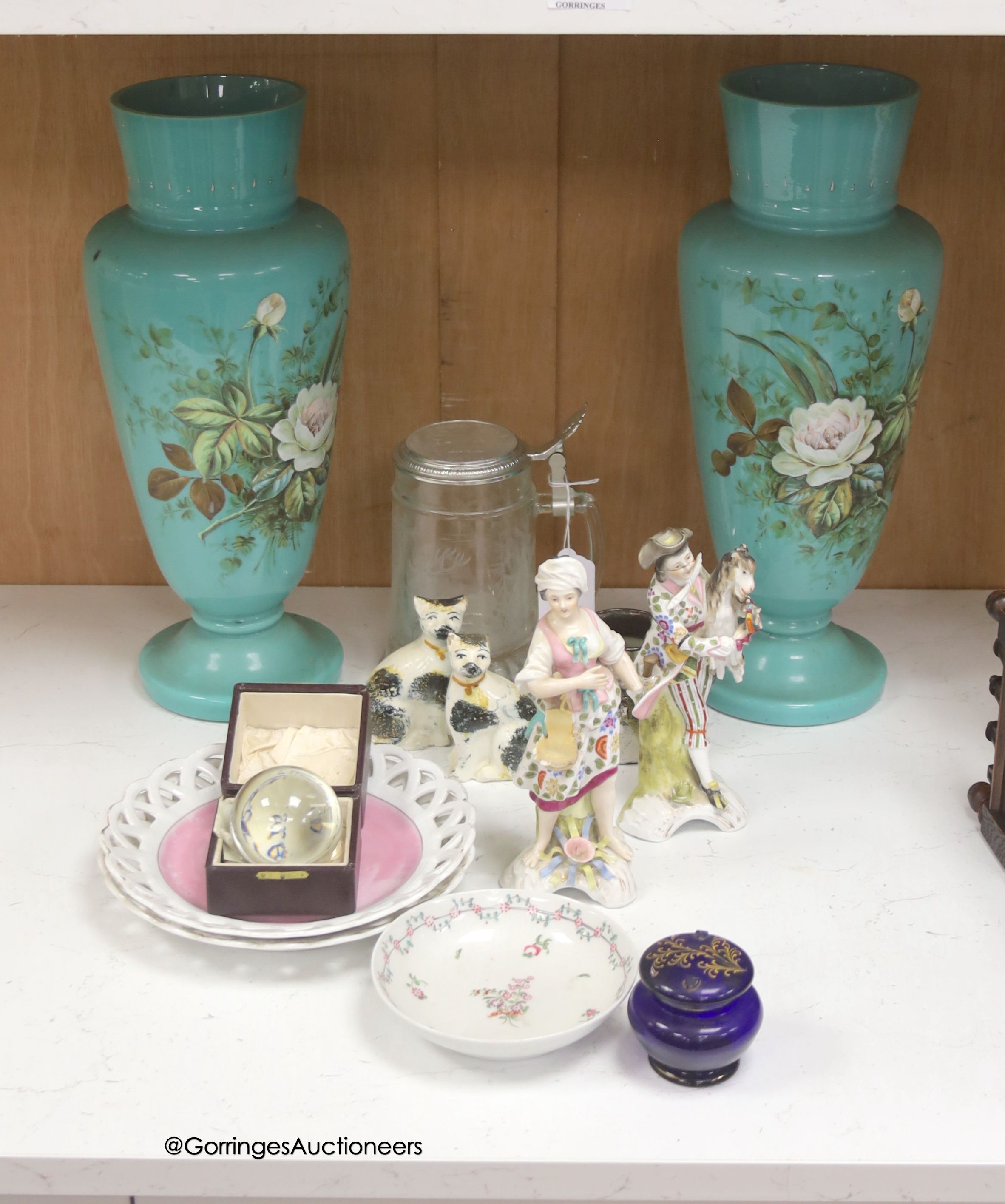 A pair of Sitzendorf porcelain figures, a pair of green vases and a clairvoyance crystal with instructions etc